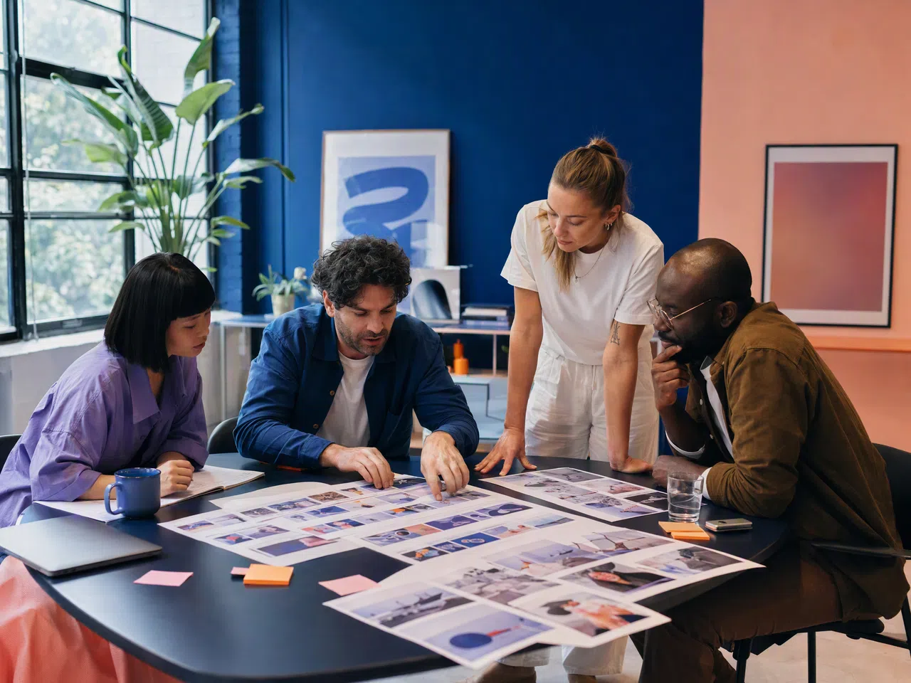 Creative agency team reviewing multi-format video content